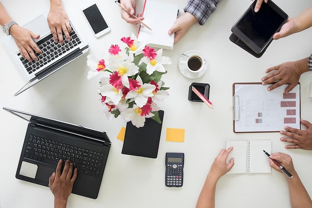 Photo directly above view of people working on table