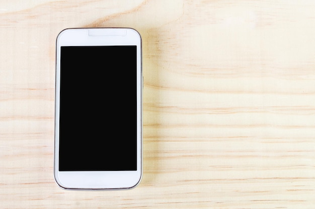 Directly above view of smart phone on table