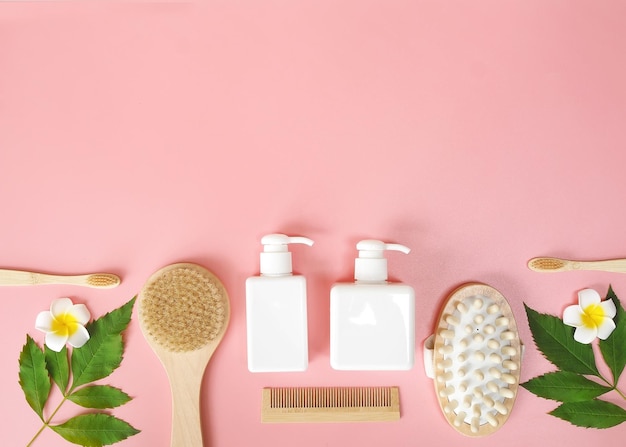 Directly above view of spa products on pink background Healthcare spa concept with copy space