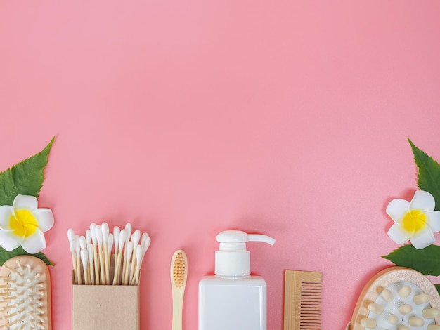 Directly above view of spa products on pink background Healthcare spa concept with copy space