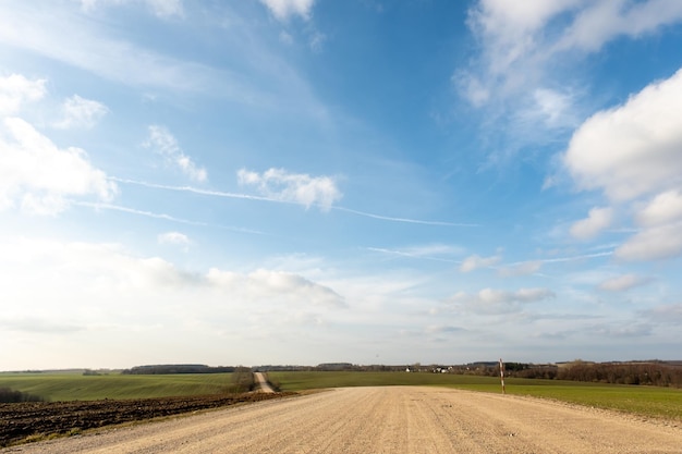 Dirt road in a field outside the city