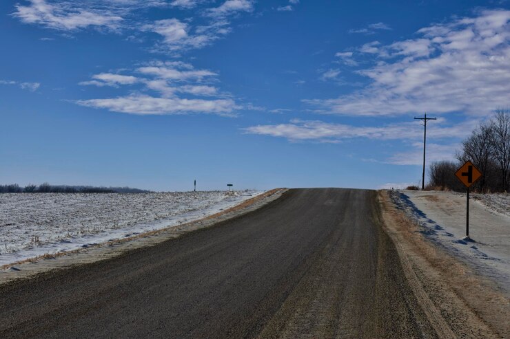 Photo a dirt road and a sign in minnesota
