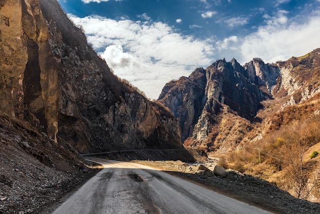 Dirt road through a mountain gorge