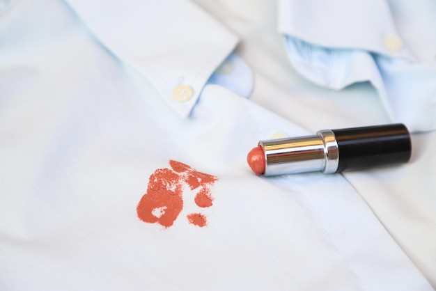 Dirty lipstick stain on cloth from daily life activity for cleaning concept housework care living