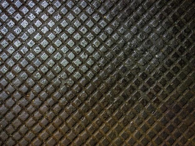 Dirty metal cast iron floor plate background