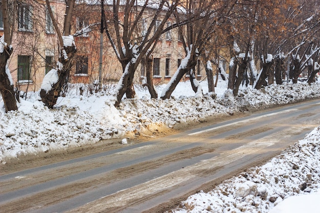 Dirty snow on the streets of the city