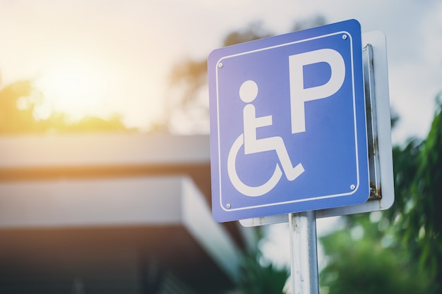 Disability car parking sign to reserved space for handicap driver vehicle park