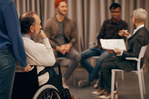 Disabled man at business meeting