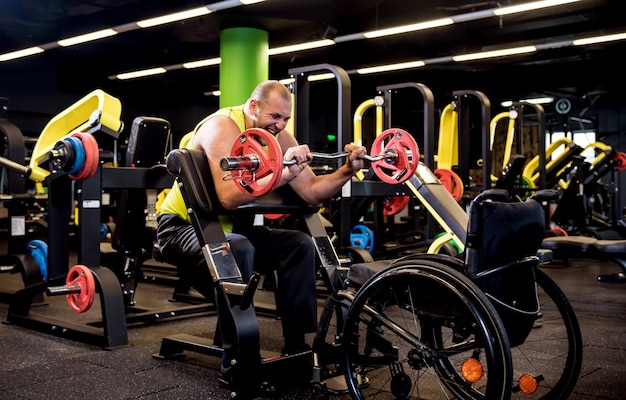 Disabled man training in the gym