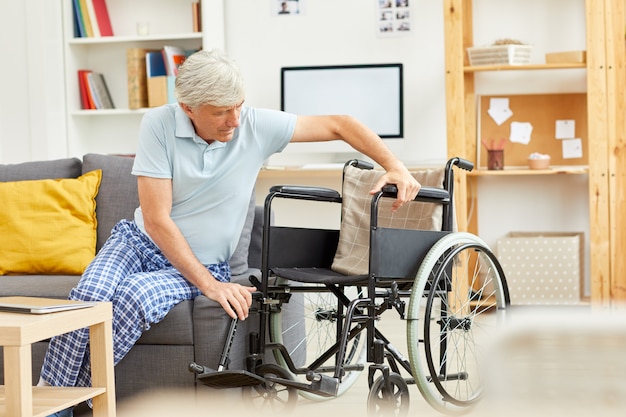 Disabled man with wheelchair