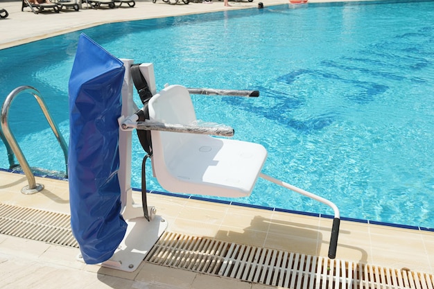 Disabled person pool lift Swinging arm disabled chair Swimming pool lift with a chair