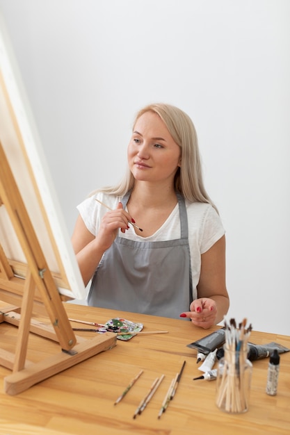 disabled person in wheelchair painting