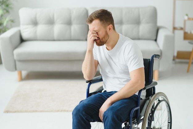 Disabled young man suffering at home