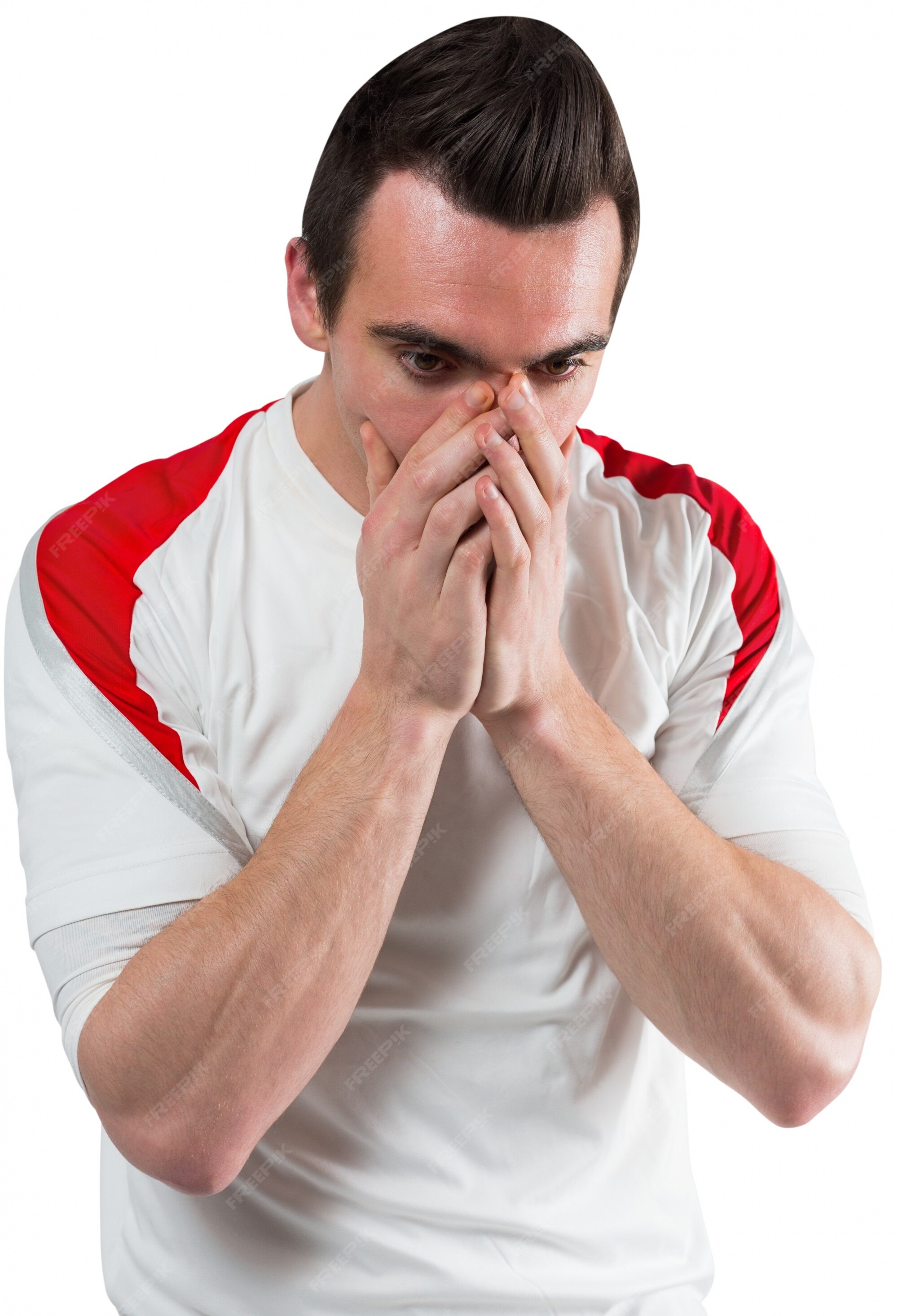 Premium Photo Disappointed football fan looking down