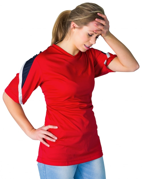 Disappointed football fan in red