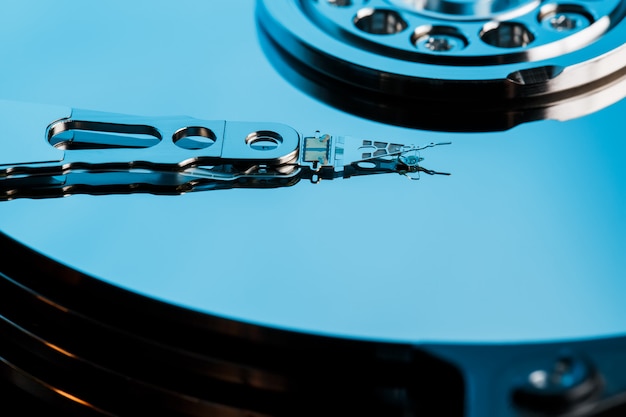 Disassembled hard drive from the computer, hdd with mirror effect