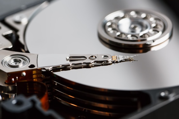 Disassembled hard drive from the computer, hdd with mirror effect