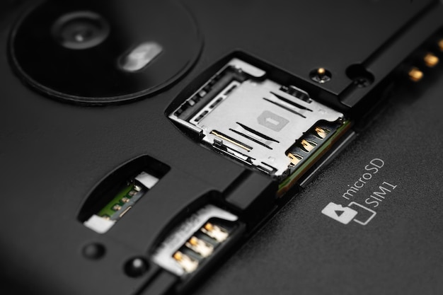disassembled smartphone closeup of the disassembled gadget with connectors