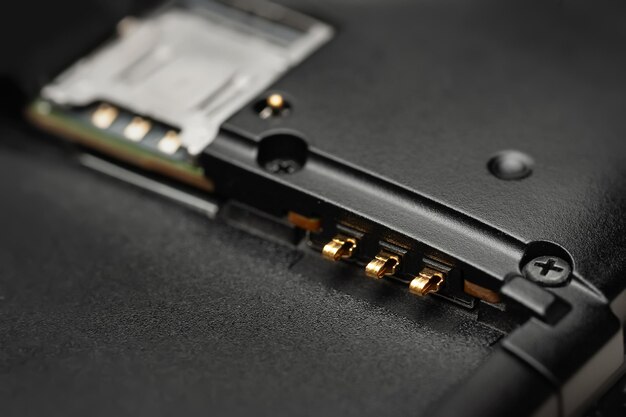 disassembled smartphone macro photo of the disassembled gadget with connectors