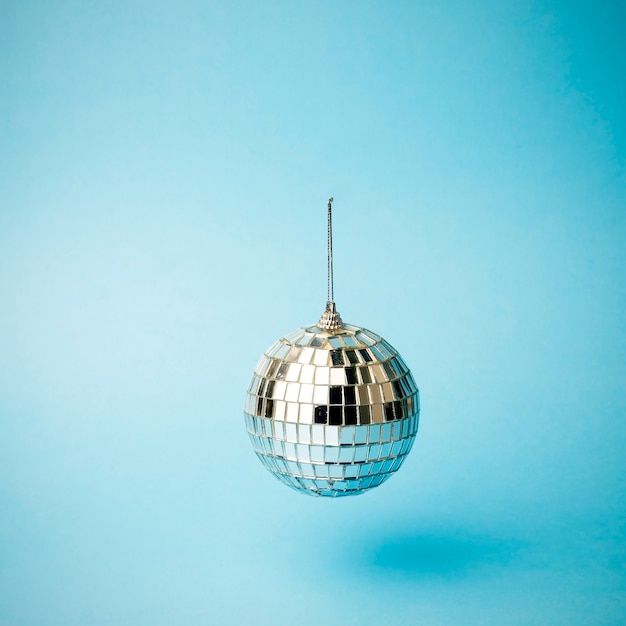 Disco ball on a colored blue background