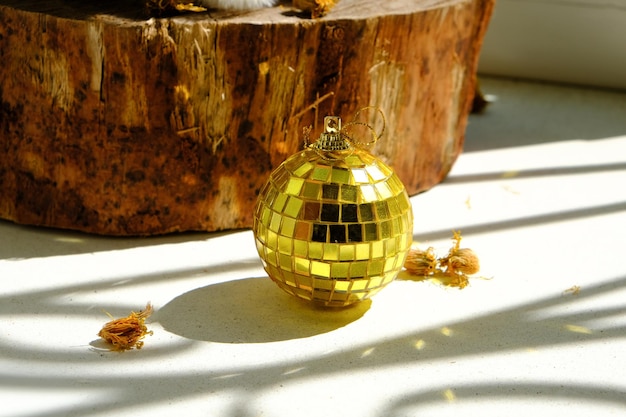 Disco ball on the windowsill lit by the sun