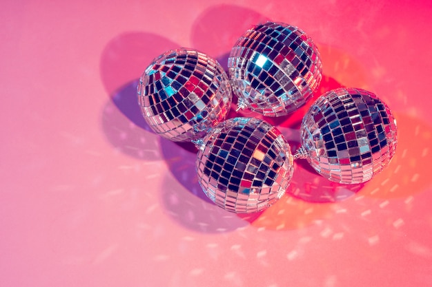 disco balls for decorationof a party on pink background Stock