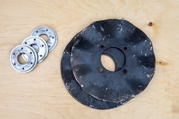 Photo discs and bearings for a tractor cultivator