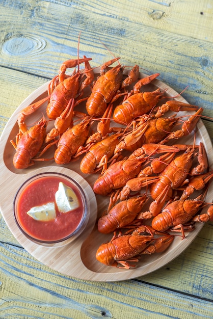 Dish of boiled crayfish with sauce