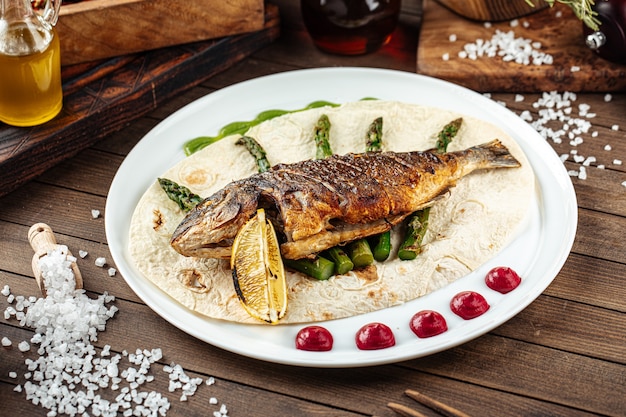 Dish of gourmet grilled dorada fish