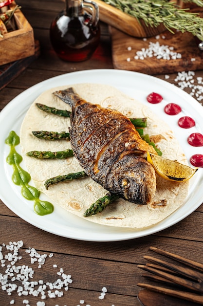 Dish of gourmet grilled dorada fish