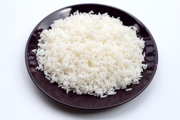 Dish of rice on white background.