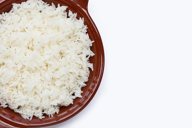 Dish of rice on white background.