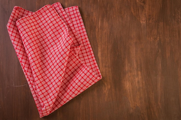 Dish towel on a wood background.