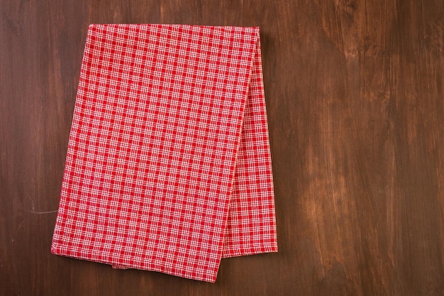 Dish towel on a wood background.