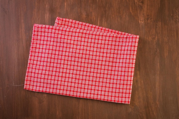 Dish towel on a wood background.