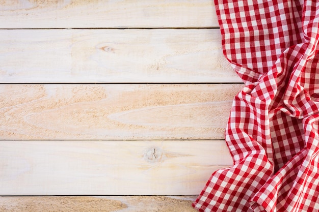 Dish towel on a wood background.