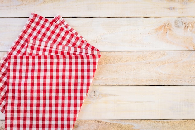 Dish towel on a wood background.