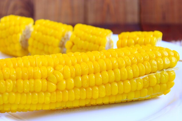 Dish with boiled corns on the plate