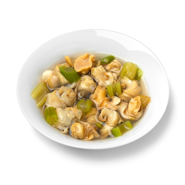 Dish with Common whelks in broth as a Brussel soup close up on white background