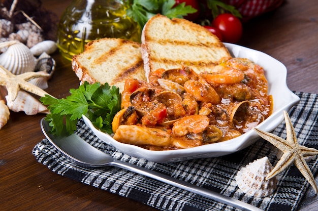 dish with fishsoup and bread