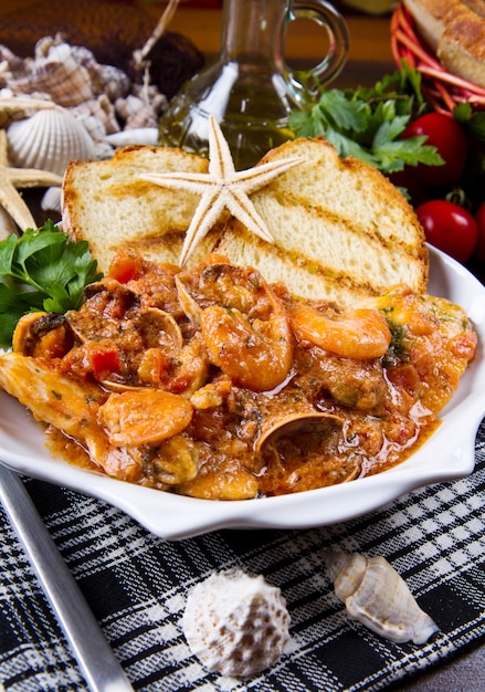 Photo dish with fishsoup and bread