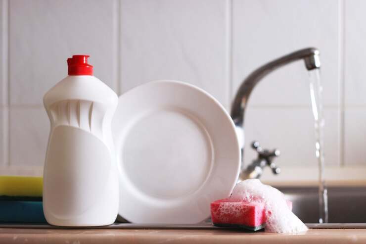 Photo dishwashing detergent close-up in the interior of the kitchen. high quality photo