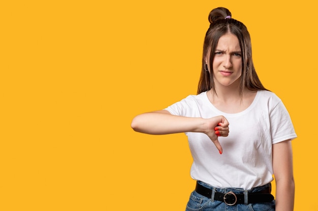 Dislike gesture bad job sad woman thumb down