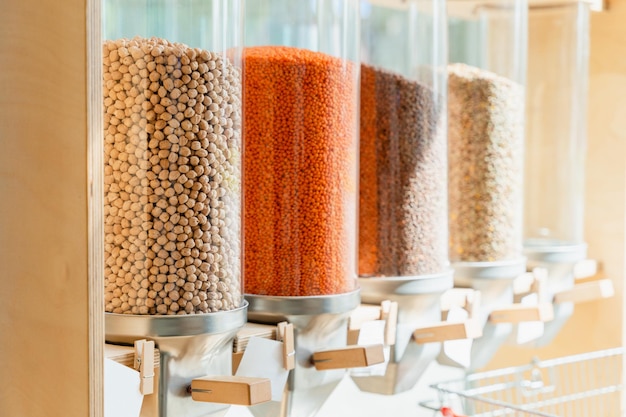 Dispensers for cereals nuts and grains in sustainable plastic free grocery store