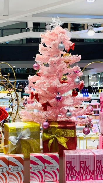 Display of a Pink Christmas tree and christmas ornaments