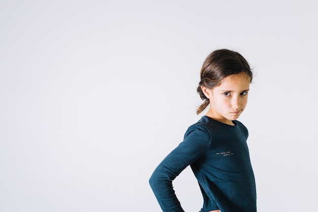 Displeased girl on white background