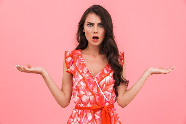 Displeased young woman posing isolated wall.