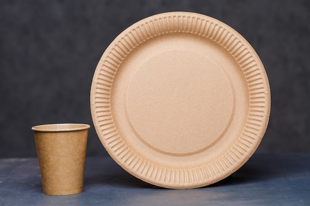 Disposable cardboard dishes made from environmentally friendly materials. Doesn't clog nature  Eco-friendly, disposable, recyclable, compostable dishes. Paper cups for drinking, dishes