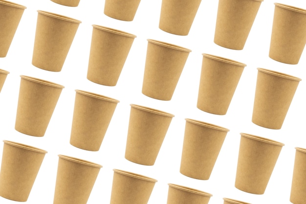 Disposable paper cups made of thick cardboard isolated and duplicated on a white background