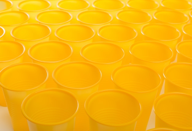 Disposable plastic glasses background